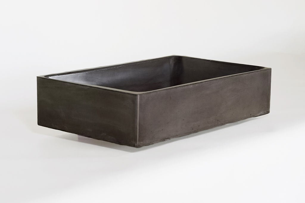 Easy upgrade for your bathroom with the timeless beauty and durability of Concrete.